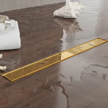 Трап душевой Plumberia Selection PS LINEAR 6x70 2устор. накладка из нерж.стали, комбинир.затвор с горизонт. Выпуском Ду 50мм,40л/мин, золото 24К, PSL70OR